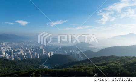 Aerial View of Gwangan Bridge, Marine City Skyline, and Dongbaekseom Island in Busan, South Korea 142710726