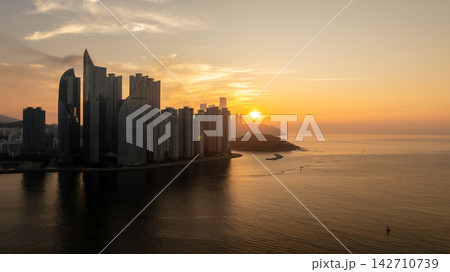 Aerial View of Gwangan Bridge, Marine City Skyline, and Dongbaekseom Island in Busan, South Korea 142710739