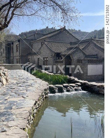 Traditional Stone Architecture And Stream In Gubei Water Town Beijing Traditional Stone Architecture And Stream In Gubei Water Town Beijing 142713802