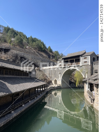 Covered Stone Arch Bridge And Canal In Gubei Water Town Beijing Covered Stone Arch Bridge And Canal In Gubei Water Town Beijing 142714539