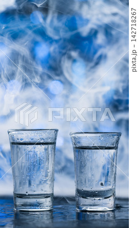Two Cold Vodka Shots With Smoke 142718267