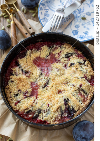 German plum pie and cardamom (Pflaumenkuchen). 142719762