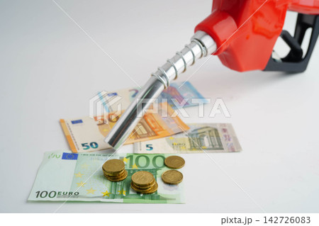 Gas pump, Fuel Nozzle with Chinese Yuan money for cost energy. 142726083