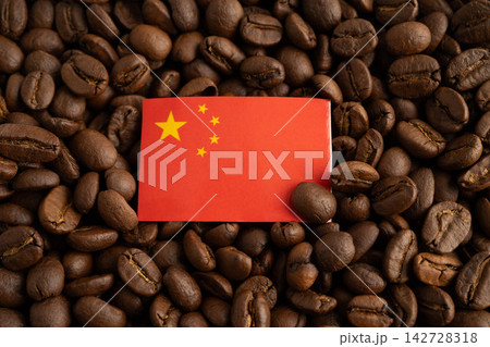 China flag on coffee beans, shopping online for export or import food product. China flag on coffee beans, shopping online for export or import food product. 142728318