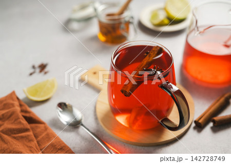 Spiced Tea with Cinnamon, Star Anise and Lemon, Cozy autumn, winter cup of tea Spiced Tea with Cinnamon, Star Anise and Lemon, Cozy autumn, winter cup of tea 142728749