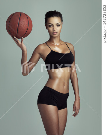 Basketball, fitness and sweat with portrait of woman in studio isolated on gray background. Exercise, sports or workout and athlete with attitude training body for challenge, health or performance Basketball, fitness and sweat with portrait of woman in studio isolated on gray background. Exercise, sports or workout and athlete with attitude training body for challenge, health or performance 142728852