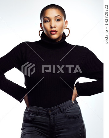 Portrait, knitwear and African woman in studio for confidence, warm outfit or trendy clothes on white background. Serious, aesthetic and model for stylish sweater, wool jersey or autumn fashion Portrait, knitwear and African woman in studio for confidence, warm outfit or trendy clothes on white background. Serious, aesthetic and model for stylish sweater, wool jersey or autumn fashion 142729222