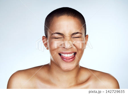 Smile, woman and beauty with skincare, cosmetics and dermatology on grey studio background. Person, model and girl with funny expression, grooming routine and treatment with shine, wellness and glow 142729635