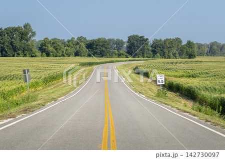 highway in rural central MIssouri with corn fields, summer scenery highway in rural central MIssouri with corn fields, summer scenery 142730097