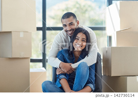 Couple, portrait and box with hug for new home with support, bonding and happiness for dream house. Homeowner, man and woman in relationship excited for relocation, property investment and moving Couple, portrait and box with hug for new home with support, bonding and happiness for dream house. Homeowner, man and woman in relationship excited for relocation, property investment and moving 142730114