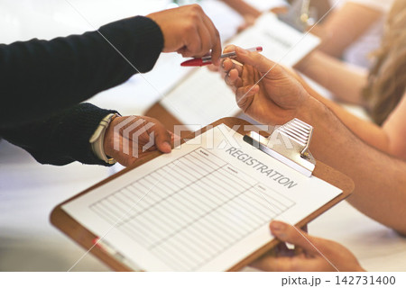 Hands, pen and people with registration document for government voting station in community. Volunteer, clipboard and election worker with person for information paperwork with signing for compliance Hands, pen and people with registration document for government voting station in community. Volunteer, clipboard and election worker with person for information paperwork with signing for compliance 142731400