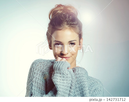 Studio background, portrait and teen girl with sweater for fashion, autumn style and smile with confidence. Female model, cotton clothes and pride for cool look, trendy and happy on mockup space Studio background, portrait and teen girl with sweater for fashion, autumn style and smile with confidence. Female model, cotton clothes and pride for cool look, trendy and happy on mockup space 142731712