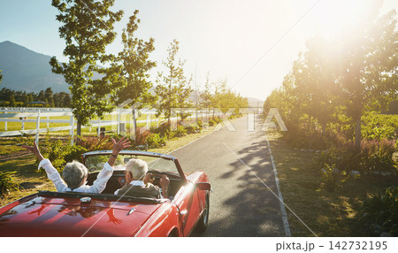 Road trip, back and old couple in car, travel adventure and romantic holiday for transportation. Retirement bonding, flare and senior people with celebration for vacation drive, vehicle and journey 142732195