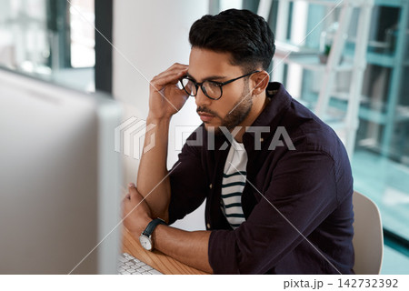Computer, thinking and business man reading email for software, brainstorming or inspiration in startup. Pc, planning and decision of creative professional web designer problem solving for solution Computer, thinking and business man reading email for software, brainstorming or inspiration in startup. Pc, planning and decision of creative professional web designer problem solving for solution 142732392