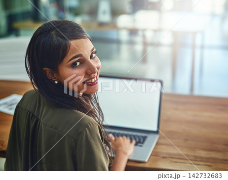 Business woman, laptop and portrait at desk with blank screen and app designer with tech. Office, professional and creative agency with website design and internet search for company seo process 142732683