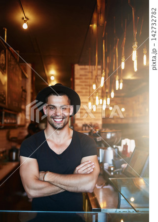 Smile, portrait and businessman with arms crossed at cafe for friendly, welcome or customer service pride. Happy, face and restaurant manager in hotel kitchen for barista sales, trust or management Smile, portrait and businessman with arms crossed at cafe for friendly, welcome or customer service pride. Happy, face and restaurant manager in hotel kitchen for barista sales, trust or management 142732782