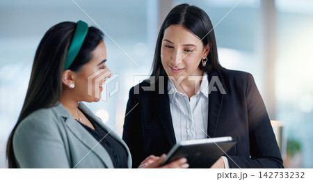 Laptop, tablet and collaboration with business people at night in the office together for teamwork. Technology, smile and a happy employee team of women working on a project or report in the evening Laptop, tablet and collaboration with business people at night in the office together for teamwork. Technology, smile and a happy employee team of women working on a project or report in the evening 142733232