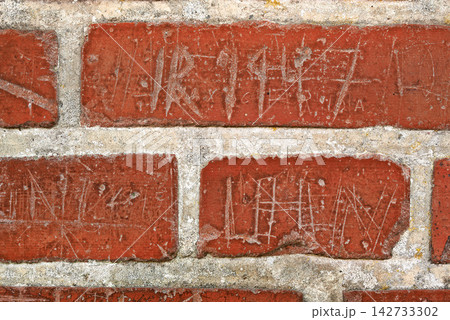 Zoom, red and old brick wall for building or concrete material for architecture, texture and surface. Stone, masonry and clay or cement to hold or plaster for construction and design exterior. Zoom, red and old brick wall for building or concrete material for architecture, texture and surface. Stone, masonry and clay or cement to hold or plaster for construction and design exterior. 142733302