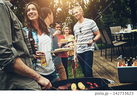 Group, drinks and bbq with food for dinner, party or reunion with alcohol in America. Friends, people and cheerful at barbecue in backyard, summer and vacation for holiday, celebration or birthday Group, drinks and bbq with food for dinner, party or reunion with alcohol in America. Friends, people and cheerful at barbecue in backyard, summer and vacation for holiday, celebration or birthday 142733623