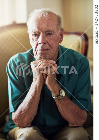 Nursing home, senior and man on couch, mental health and thinking in living room, recovery and healthcare of person. House, lounge and patient of Alzheimers, retirement and hope for treatment 142733802