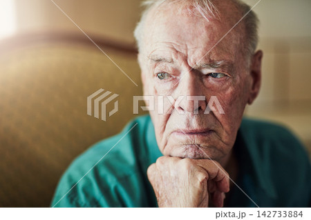 Elderly, man and sad with thinking of memory in retirement home with remember, nostalgia or reflection on sofa. Senior, person and lonely with alzheimers, depression and thoughtful on couch in lounge Elderly, man and sad with thinking of memory in retirement home with remember, nostalgia or reflection on sofa. Senior, person and lonely with alzheimers, depression and thoughtful on couch in lounge 142733884