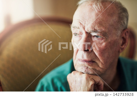 Senior, man and depression with thinking of memory in retirement home with remember, nostalgia or reflection on sofa. Elderly, person and sad with alzheimers, lonely and thoughtful on couch or mockup Senior, man and depression with thinking of memory in retirement home with remember, nostalgia or reflection on sofa. Elderly, person and sad with alzheimers, lonely and thoughtful on couch or mockup 142733928
