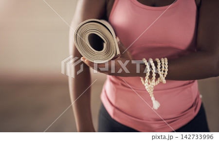 Yoga, woman hands and mat for exercise, meditation and ready for spiritual awareness. Female person, self care and equipment for pilates or wellness in studio, mindfulness and mala beads for prayer Yoga, woman hands and mat for exercise, meditation and ready for spiritual awareness. Female person, self care and equipment for pilates or wellness in studio, mindfulness and mala beads for prayer 142733996