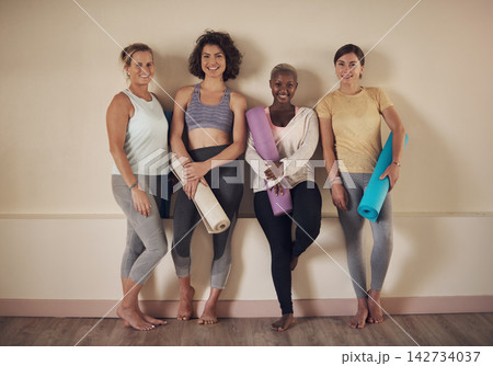 Wall, group and friends for relax in yoga class, activewear and smile for fitness in wellness centre. Workout, portrait and training in studio for flexibility, pilates and health and holistic hobby 142734037