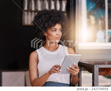 Black woman, owner and thinking with tablet by coffee shop for menu planning, inventory management and research sales trends. African entrepreneur, online and thoughts for business website and ideas. 142734058