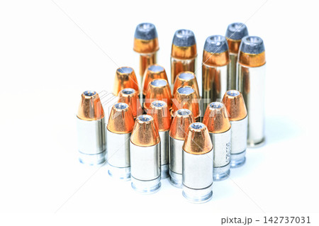 bullet 9mm kurz or .380 acp JHP ( Jacketed Hollow Point ) encompass with .38 Special Semi Jacketed Hollow Point isolate on white background. bullet 9mm kurz or .380 acp JHP ( Jacketed Hollow Point ) encompass with .38 Special Semi Jacketed Hollow Point isolate on white background. 142737031