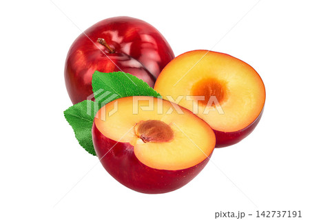 fresh red plum half with leaves isolated on white background fresh red plum half with leaves isolated on white background 142737191