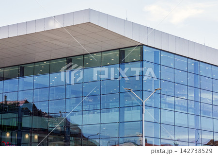 Nitra, Slovakia - May 27, 2024: Modern Glass Facade of Galeria Mlyny Shopping Center Nitra, Slovakia - May 27, 2024: Modern Glass Facade of Galeria Mlyny Shopping Center 142738529