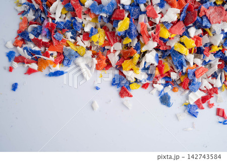 Plastic colorful pieces recycling shredded for industrial use. Plastic colorful pieces recycling shredded for industrial use. 142743584