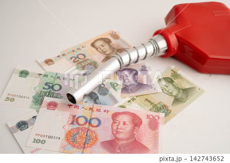 Gas pump, Fuel Nozzle with banknote money for cost energy. 142743652