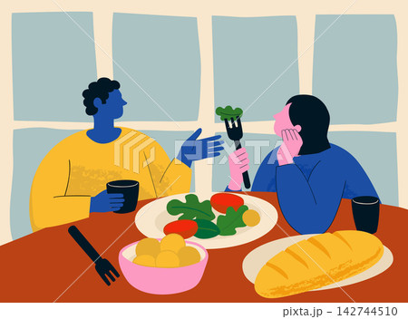 Couple or Friends Sharing Healthy Meal Together Couple or Friends Sharing Healthy Meal Together 142744510