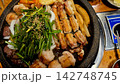 鉄板で香ばしく焼ける本場韓国料理のコプチャン（牛ホルモン焼き） 142748745