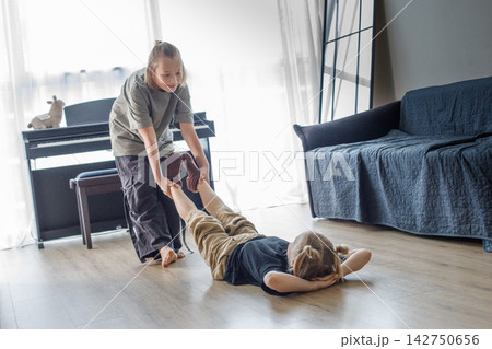 Little children having fun at home sibling portrait Little children having fun at home sibling portrait 142750656