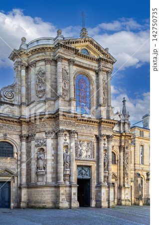 Baroque facade of Notre Dame Church with detailed stone carvings in Bordeaux, France. Bright daylight view of historical monument Baroque facade of Notre Dame Church with detailed stone carvings in Bordeaux, France. Bright daylight view of historical monument 142750735