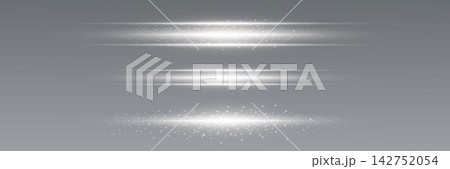 Bright lens flare effect and shimmering particles forming horizontal abstract streaks Bright lens flare effect and shimmering particles forming horizontal abstract streaks 142752054