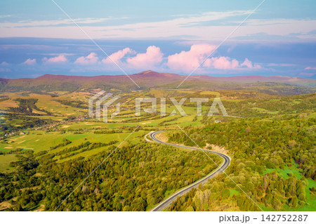 Aerial view of the mountains and valley with highway in spring. Beautiful nature landscape. Carpathian mountains. Ukraine 142752287