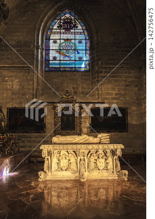 Recumbent marble tomb effigy on an ornate sarcophagus in Seville Cathedral 142756475