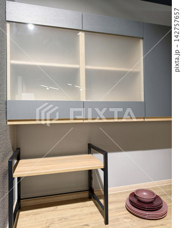 Customizable kitchen mockups displayed in a store to give buyers an idea of personalized kitchen layouts Customizable kitchen mockups displayed in a store to give buyers an idea of personalized kitchen layouts 142757657
