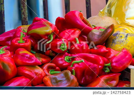 Fresh organic red peppers Fresh organic red peppers 142758423