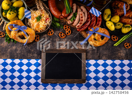 Oktoberfest food: beer, pretzel, sausages, stewed cabbage, potato 142758456