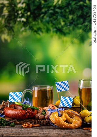Oktoberfest food: beer, pretzel, sausages, stewed cabbage, potato Oktoberfest food: beer, pretzel, sausages, stewed cabbage, potato 142758458