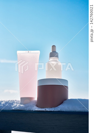 Skincare products for winter hydration in snow Skincare products for winter hydration in snow 142760021