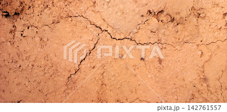 Macro Shot of Cracked Mud Wall Texture Macro Shot of Cracked Mud Wall Texture 142761557
