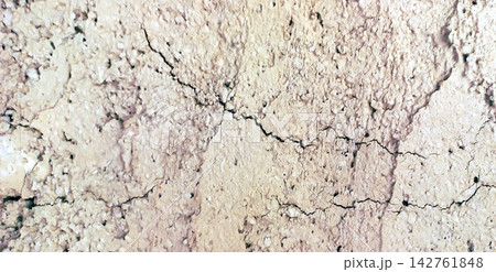 Cracked Granular Earth and Stone Texture Cracked Granular Earth and Stone Texture 142761848