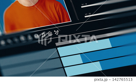 Editing a deep fake video using software tools on a computer screen with colorful interface 142765513