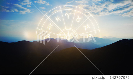 Astrology zodiac signs displayed against a mountain landscape at sunset Astrology zodiac signs displayed against a mountain landscape at sunset 142767073